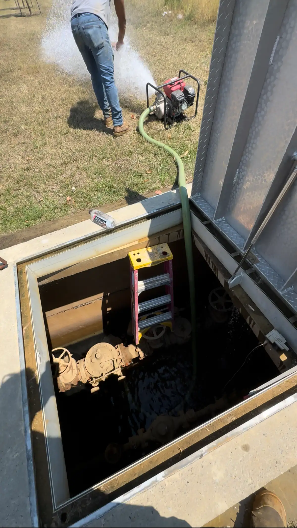 Commercial irrigation vault being serviced during a maintenance visit in South Jersey