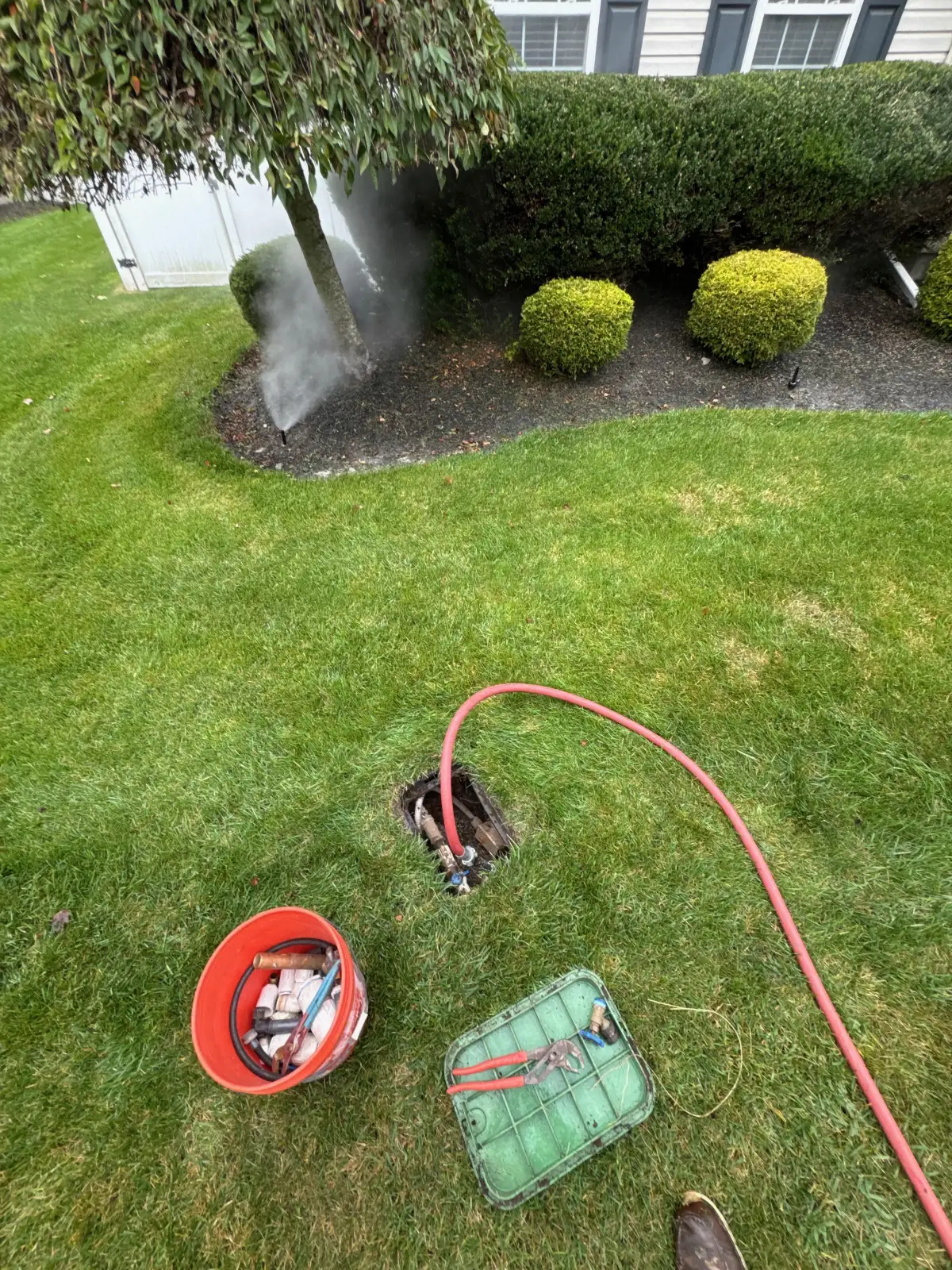 Sprinkler winterization blowout in progress at South Jersey home